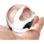 DSJUGGLING Dawson clear acrylic contact juggling ball front view showing flawless transparency