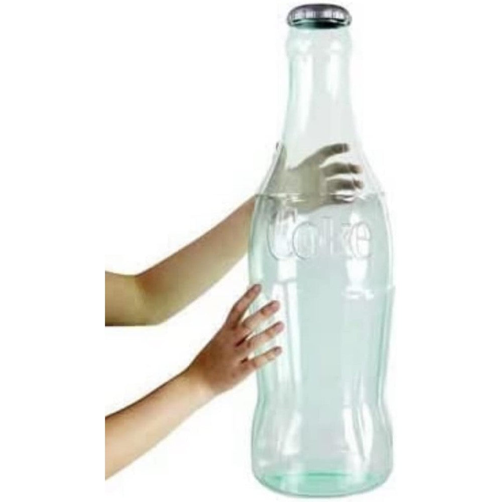Coca-Cola clear bottle bank front view showing transparent plastic contour shape and red twist-off cap.