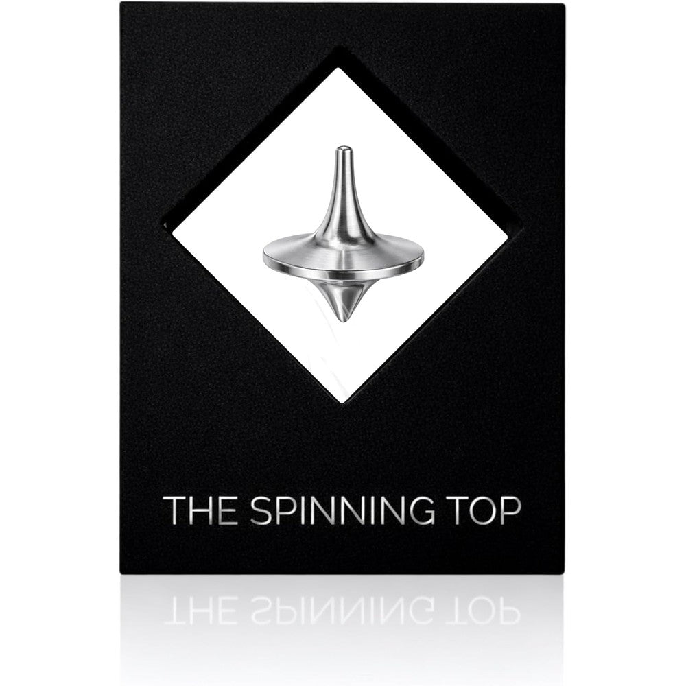 BruceCharlesDesigns Stainless Steel Spinning Top front view on desk
