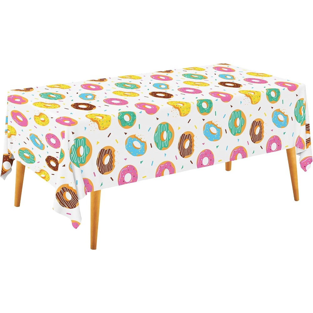 Gatherfun donut party tablecloth two pack spread over a rectangular birthday table