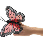 Folkmanis Mini Monarch Butterfly Finger Puppet front view showcasing realistic orange and black wings.