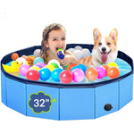 PUPTILY foldable pet swimming pool front view filled with water in a backyard setting.