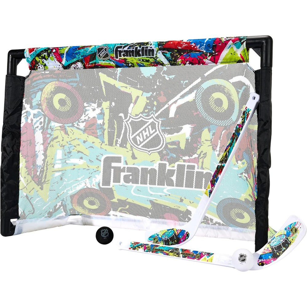 Franklin Sports NHL kids mini hockey set front view showing the graffiti style indoor net.