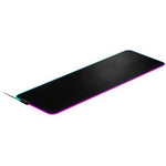 SteelSeries QcK Prism Cloth XL RGB gaming mouse pad front view featuring illuminated dual zone edges on a desk setup.