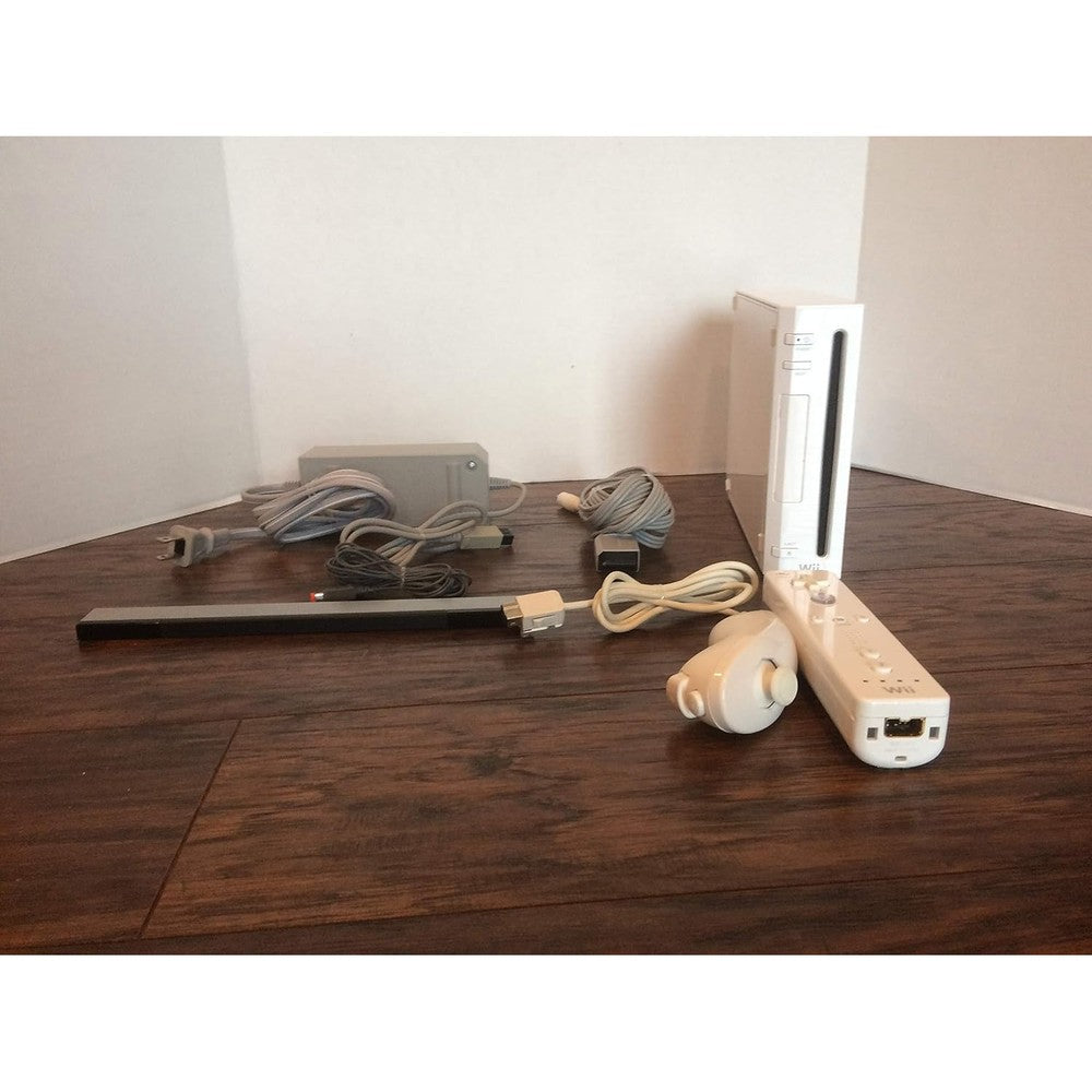 Nintendo Wii White console front view with GameCube ports open.