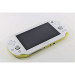 Sony PlayStation Vita Slim lime green and white handheld console front view showing buttons and analog sticks.