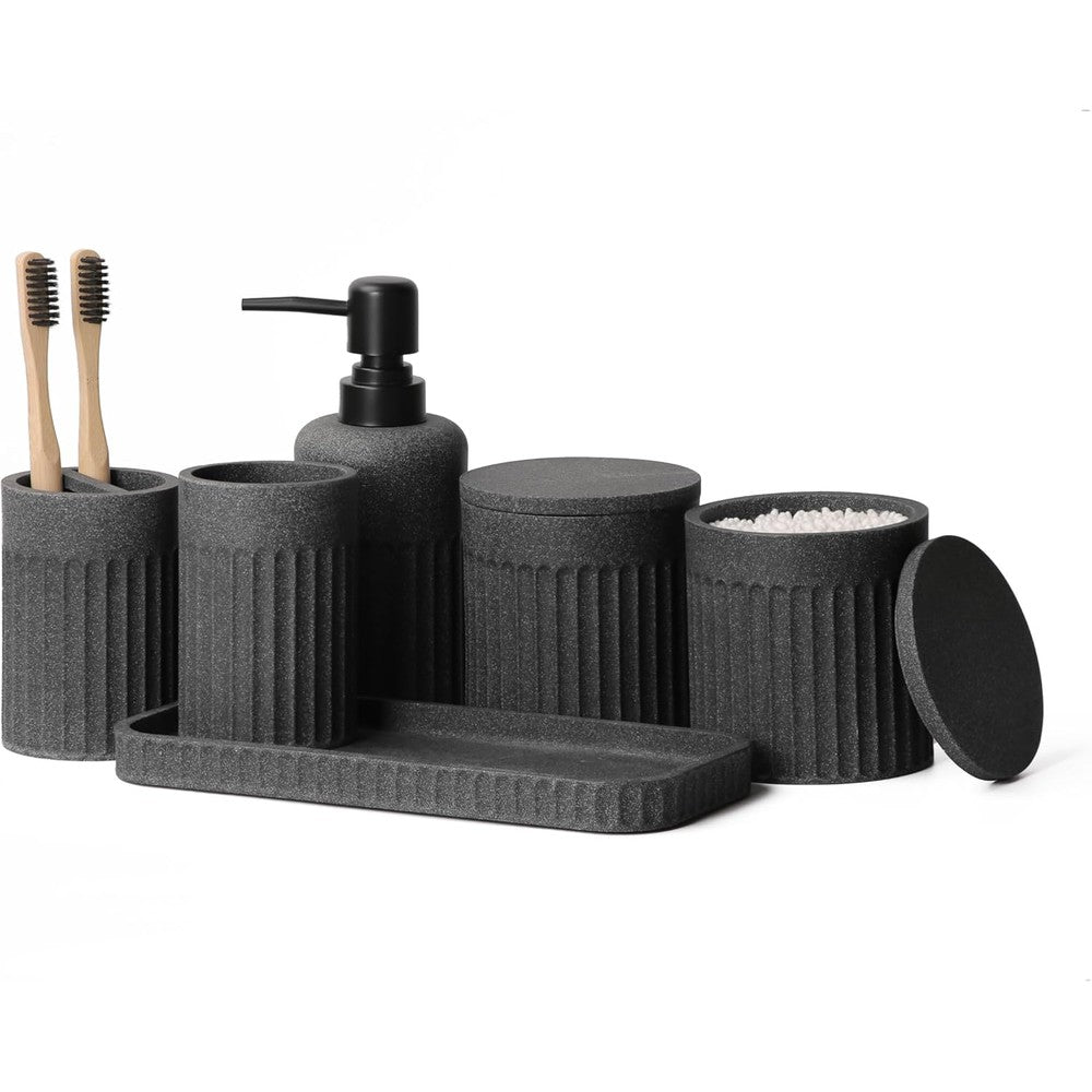 INIUNIK bathroom accessories set front view showing dark grey resin soap dispenser and toothbrush holder on vanity counter