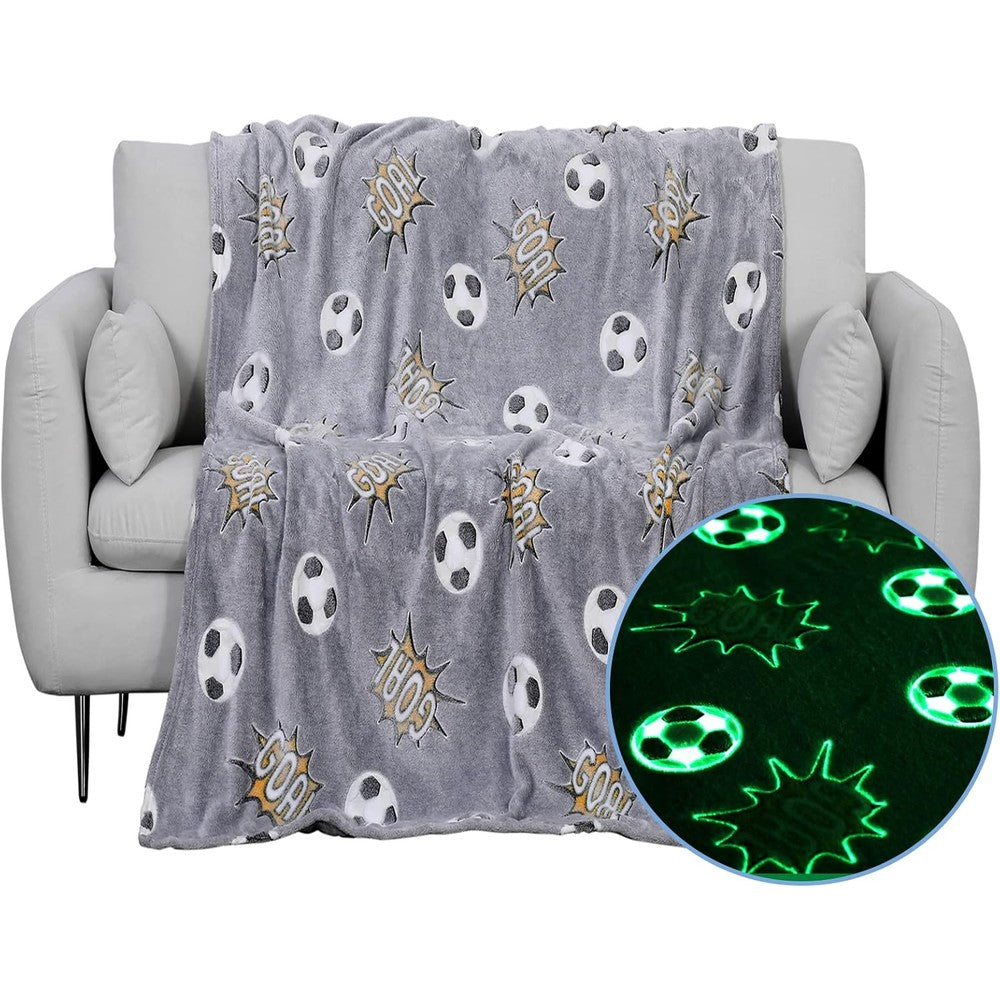 Wesan glow in the dark soccer blanket front view featuring luminous football patterns.