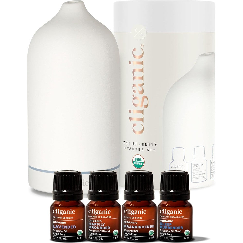 Cliganic Serenity Essential Oils Diffuser Set front view showing white ceramic diffuser and four oil bottles
