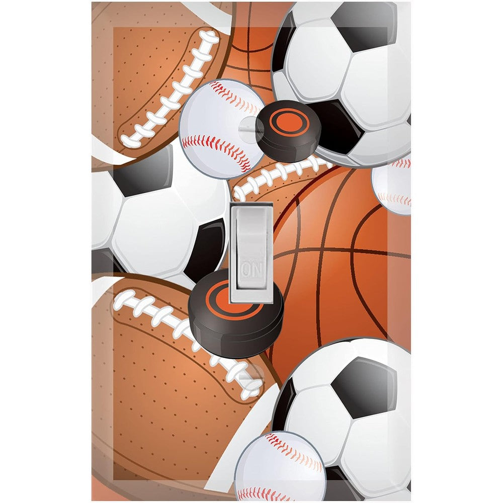 Create-A-Mural kids sports light switch cover plate front view featuring soccer and football themes.