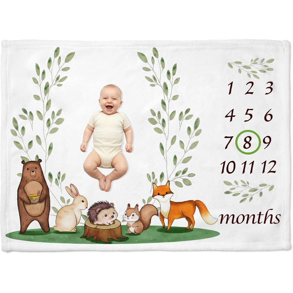 NOVO baby monthly milestone blanket flat lay view with woodland theme
