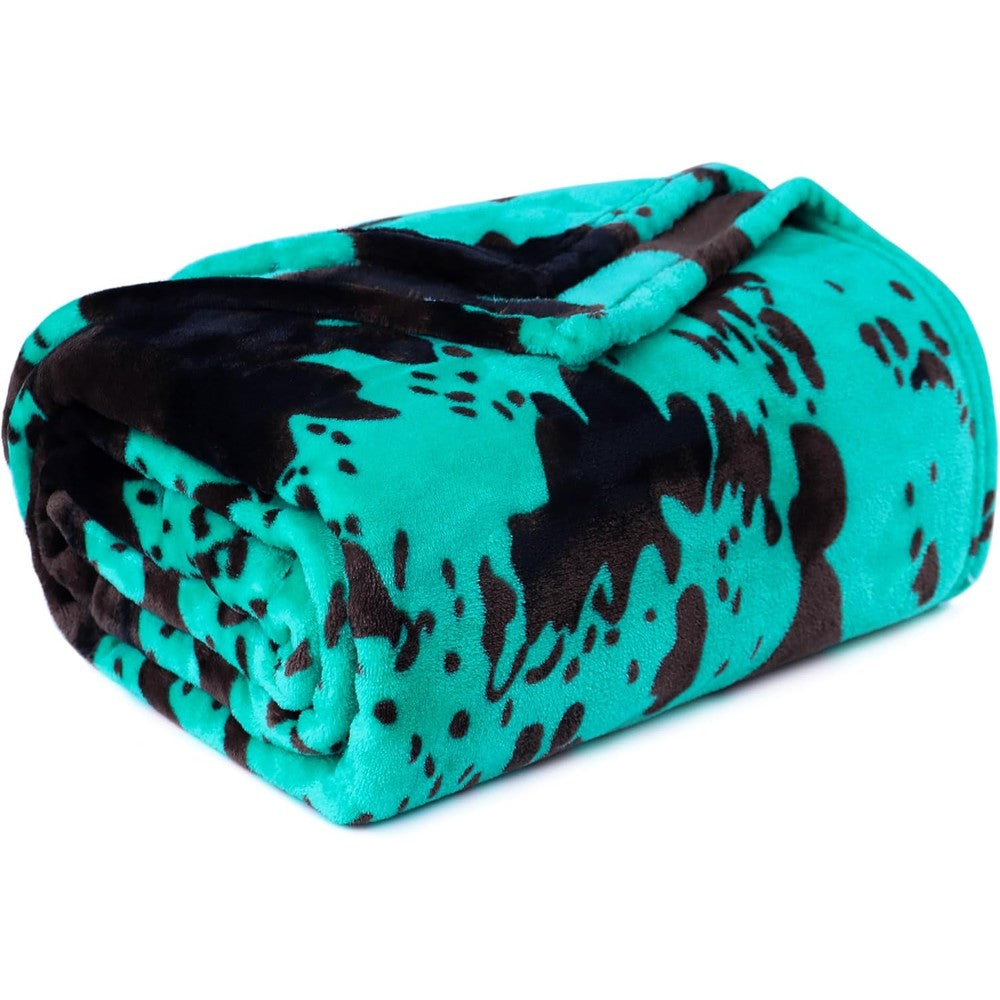 IMUKU fleece baby blanket front view showing the teal blue and black cow print design.