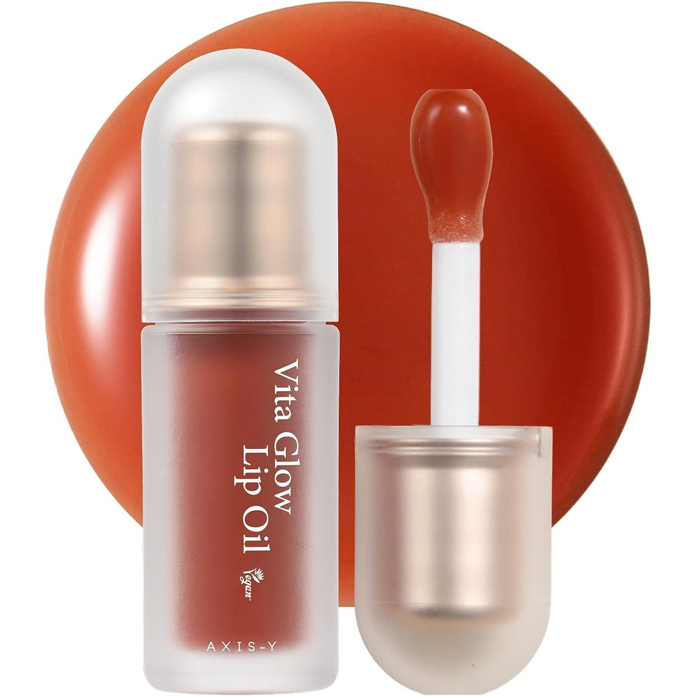 AXIS-Y Vita Glow Lip Oil Cozy Fig front view showcasing packaging and wand applicator.