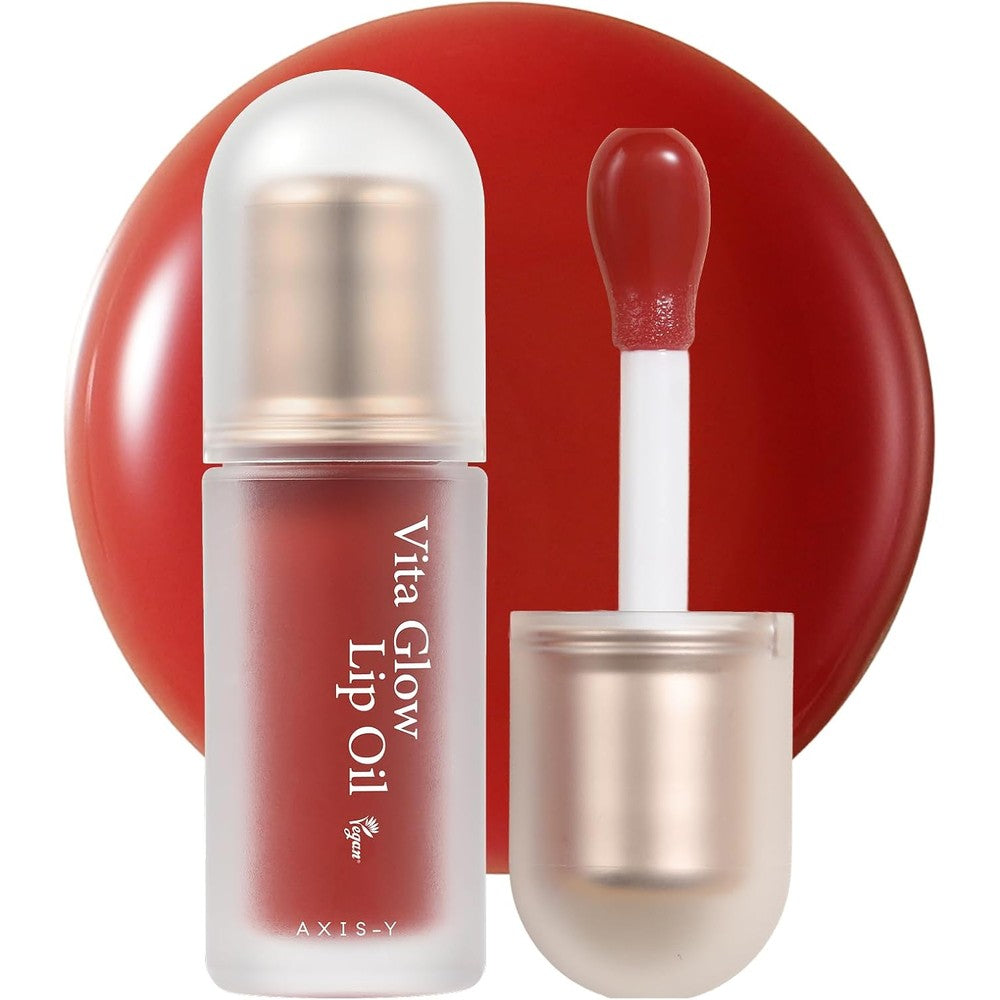 AXIS-Y Vita Glow Lip Oil Chilled Berry front view showcasing the sleek packaging and velvet tip applicator.