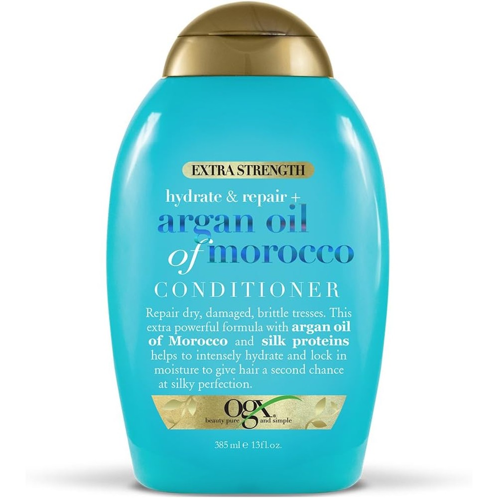 OGX Extra Strength Argan Oil of Morocco Conditioner front view teal bottle with gold cap.