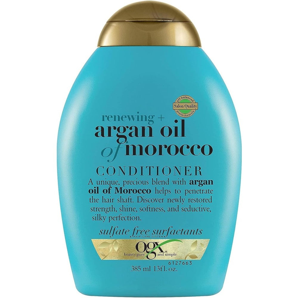 OGX Renewing Moroccan Argan Oil Conditioner front view of the thirteen ounce bottle for professional hair hydration.