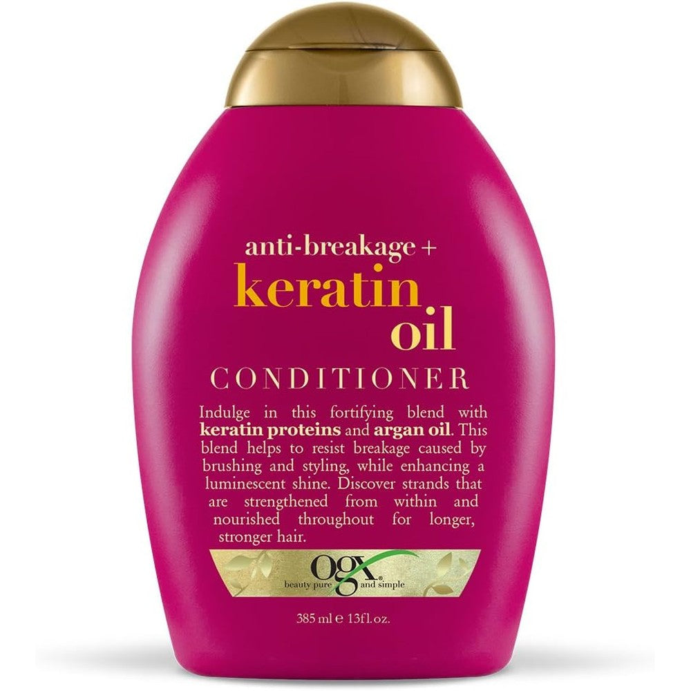 Ogx Anti-Breakage Keratin Oil Conditioner front view 13 Fluid Ounce