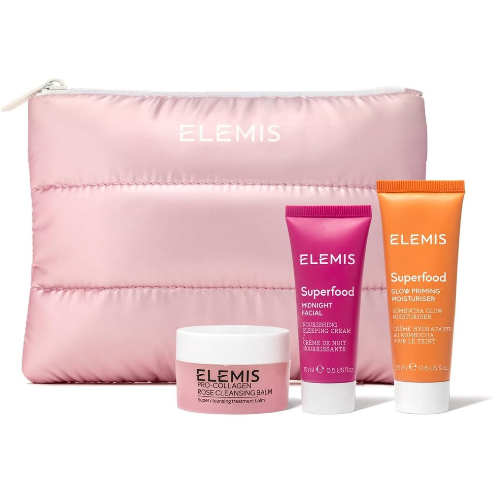 ELEMIS Way to Glow Exclusive Skincare Kit travel set front view showing three product bottles and pink quilted bag.