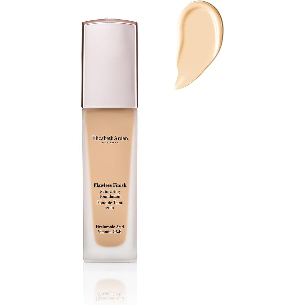 Elizabeth Arden Flawless Finish Skincaring Foundation front view showing the elegant glass bottle and pump dispenser.