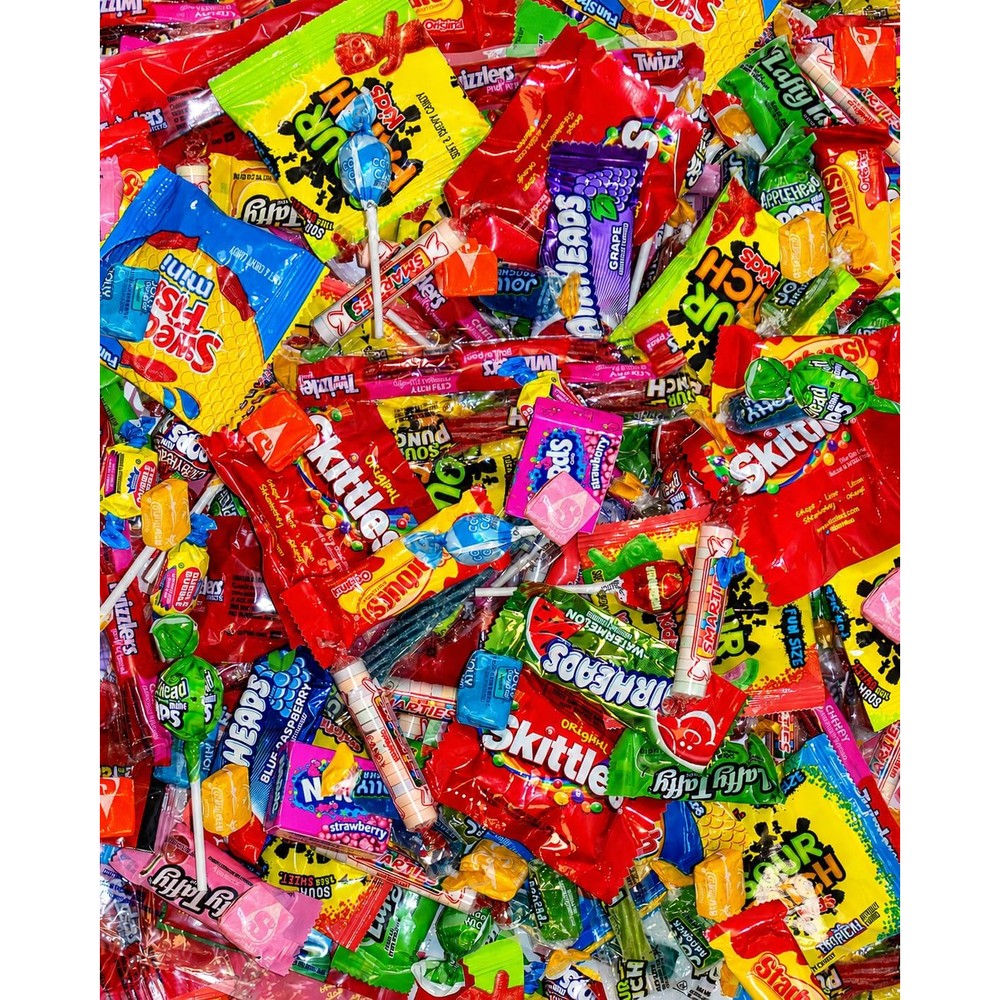 Sugadelic Bulk Candy Variety Pack front view showing the two pounds assortment bag filled with colorful sweets.