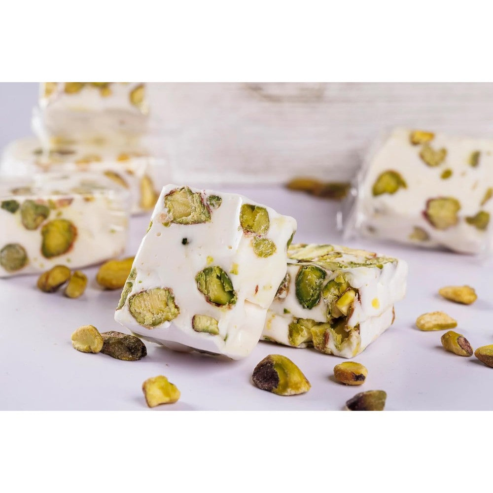US Snacks Gourmet Pistachio Nougat front packaging view showing individually wrapped soft candies.