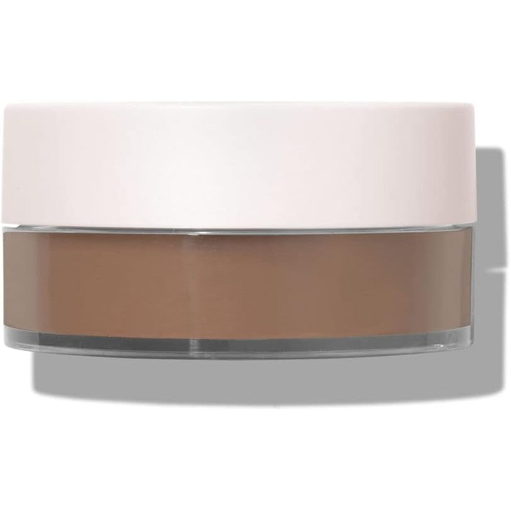Rare Beauty Always an Optimist Soft Radiance Setting Powder front view container with loose mineral powder.
