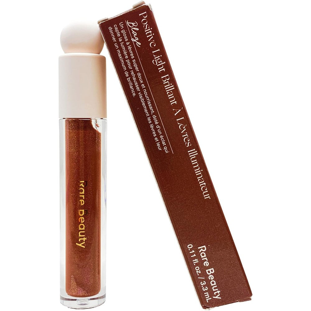 Rare Beauty Positive Light Luminizing Lip Gloss In Shade Blaze 0.11 Fluid Ounce Cushiony Hydrating Shimmer For Glass Like Shine