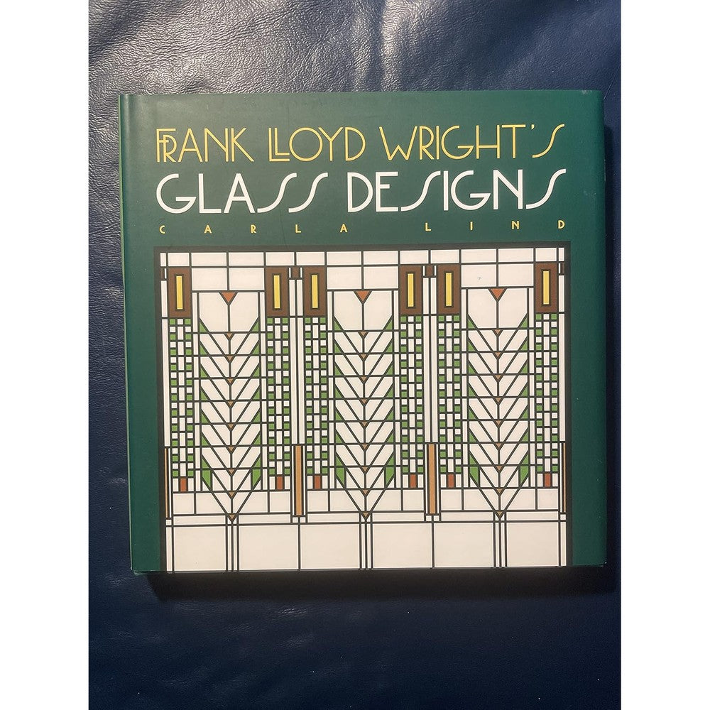 Carla Lind Frank Lloyd Wright Glass Designs book front cover showing geometric stained glass patterns.